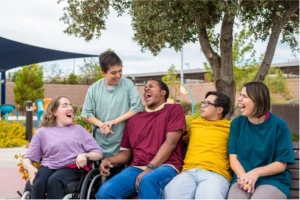 Special Needs Trusts Online - special needs trust organization - Family smiling together, representing how a special needs trust supports lifelong care