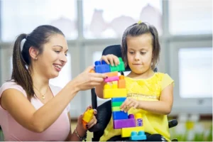 Special Needs Trusts Online - trust for vulnerable person - Mother and adult daughter with a disability smiling together, exploring a trust for disabled adult and protected benefits