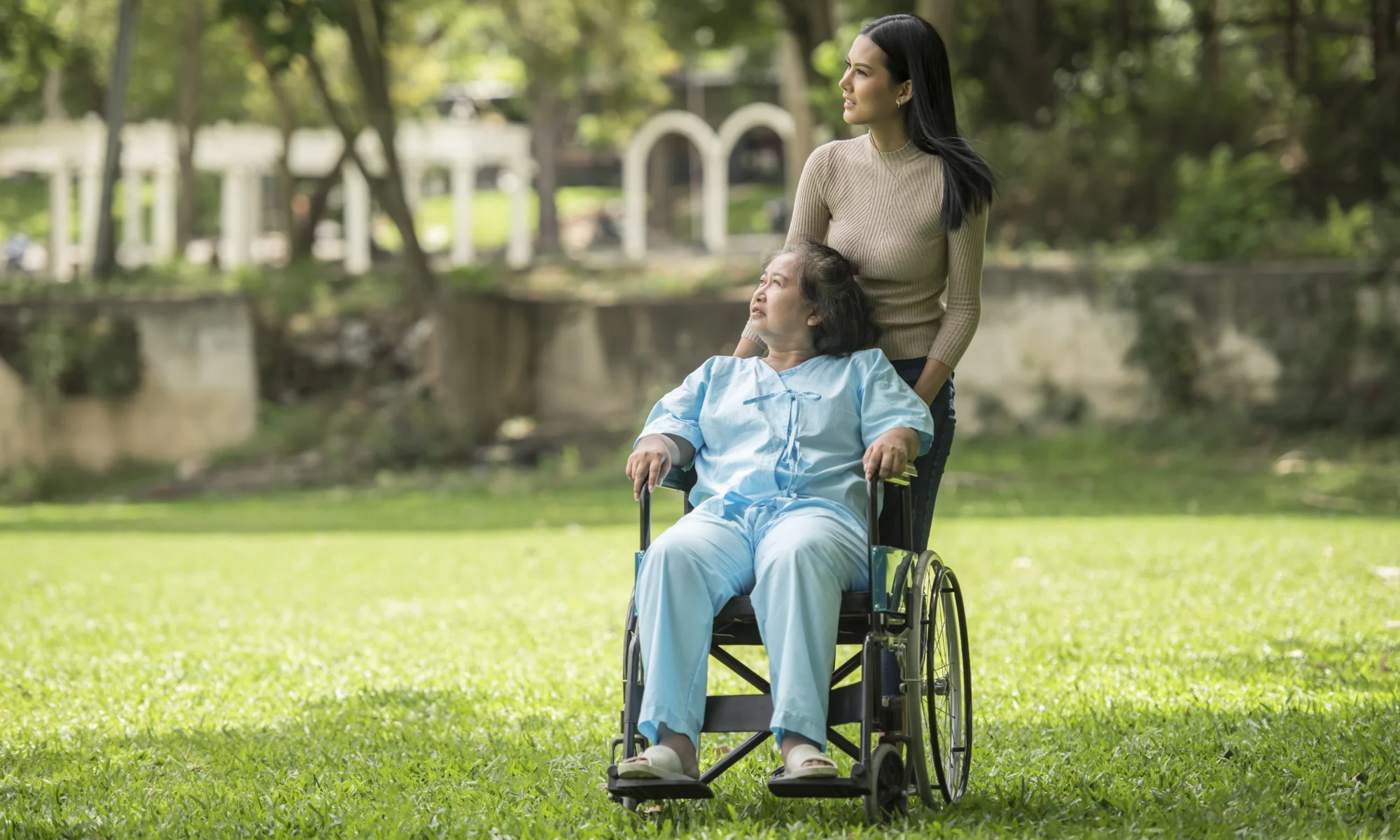 Special Needs Trusts Online - trust for vulnerable person - Mother and adult daughter with a disability smiling together, exploring a trust for disabled adult and protected benefits