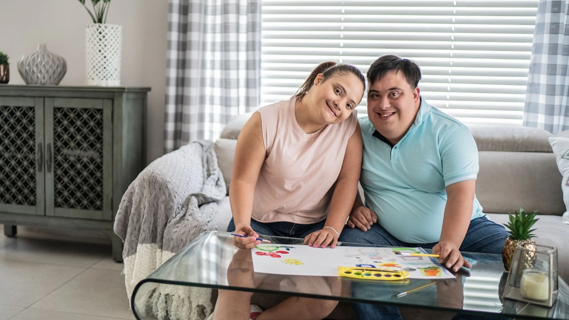 Special Needs Trusts Online - special needs trust organization - Family smiling together, representing how a special needs trust supports lifelong care