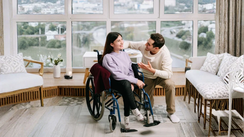 Special Needs Trusts Online - special needs trust organization - Caregiver and wheelchair user conversation, reflecting trust planning for vulnerable persons